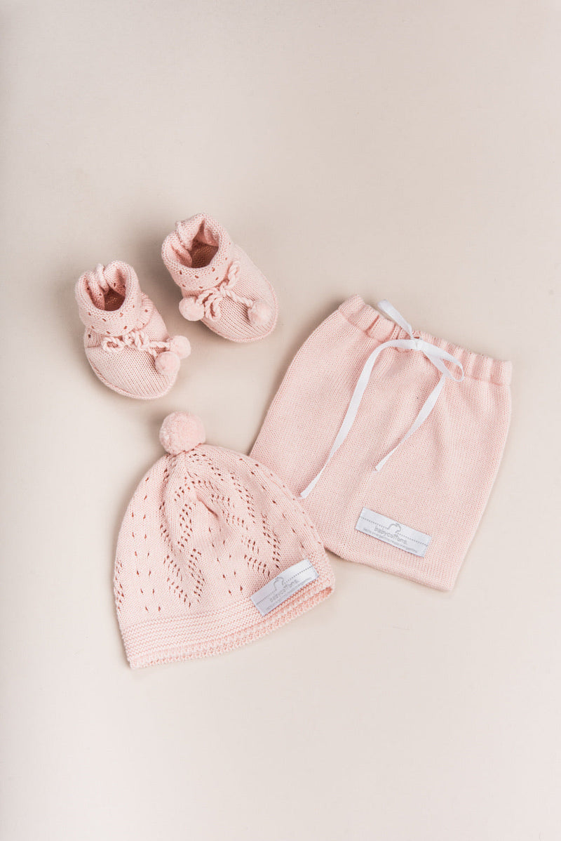 Set booties y sombrero tejido rosa